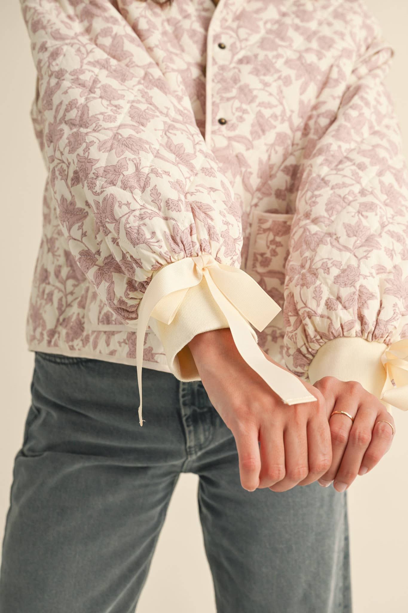 FLORAL QUILTED JACKET WITH RIBBON DETAIL MJK3622