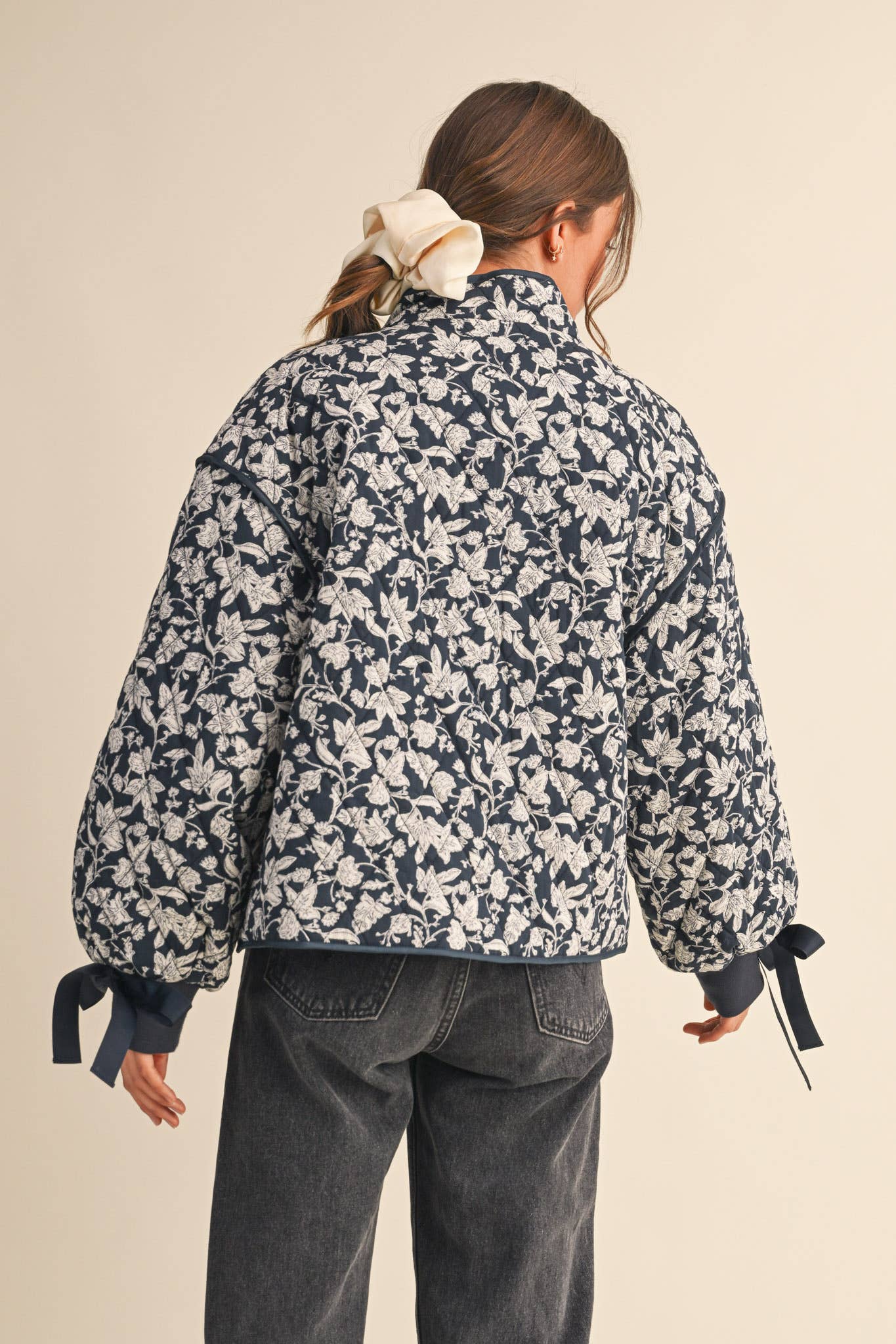 FLORAL QUILTED JACKET WITH RIBBON DETAIL MJK3622